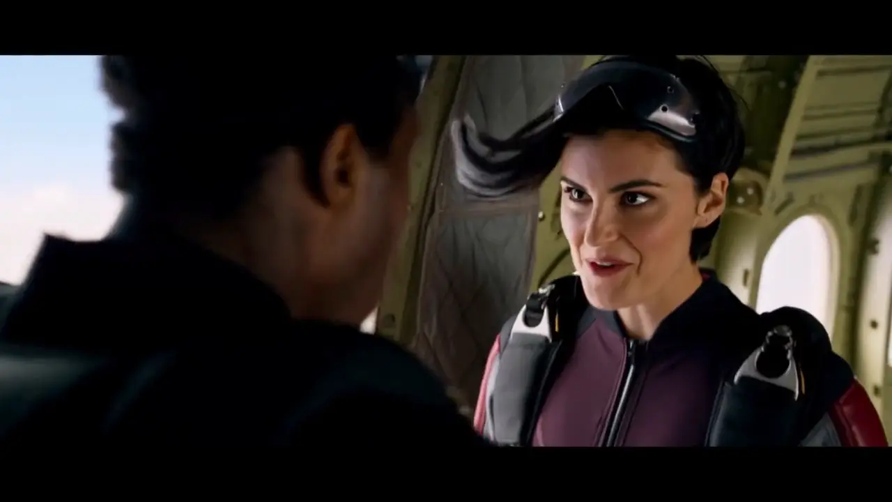 Kling 4.0 clip: a skydiver in a helmet talks to her partner at the open door of a plane before the jump